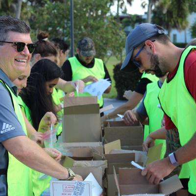 Students Helping with Food Packaging